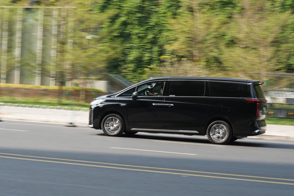 Black_car_on_road_1440