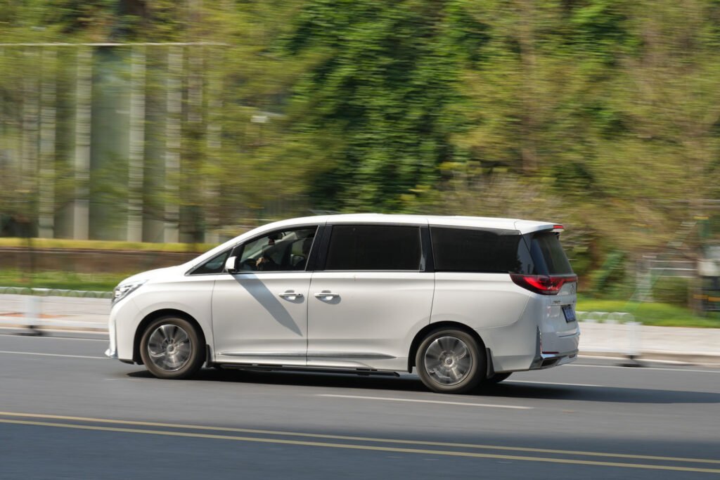 White_car_driving_1440